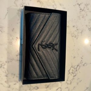 All black YSL wallet